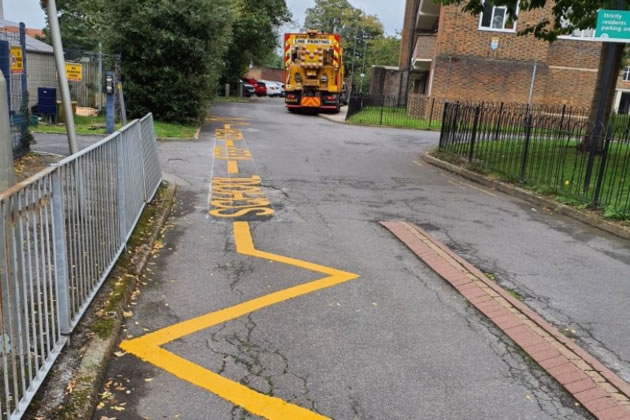 Freshly painted lines outside a borough school